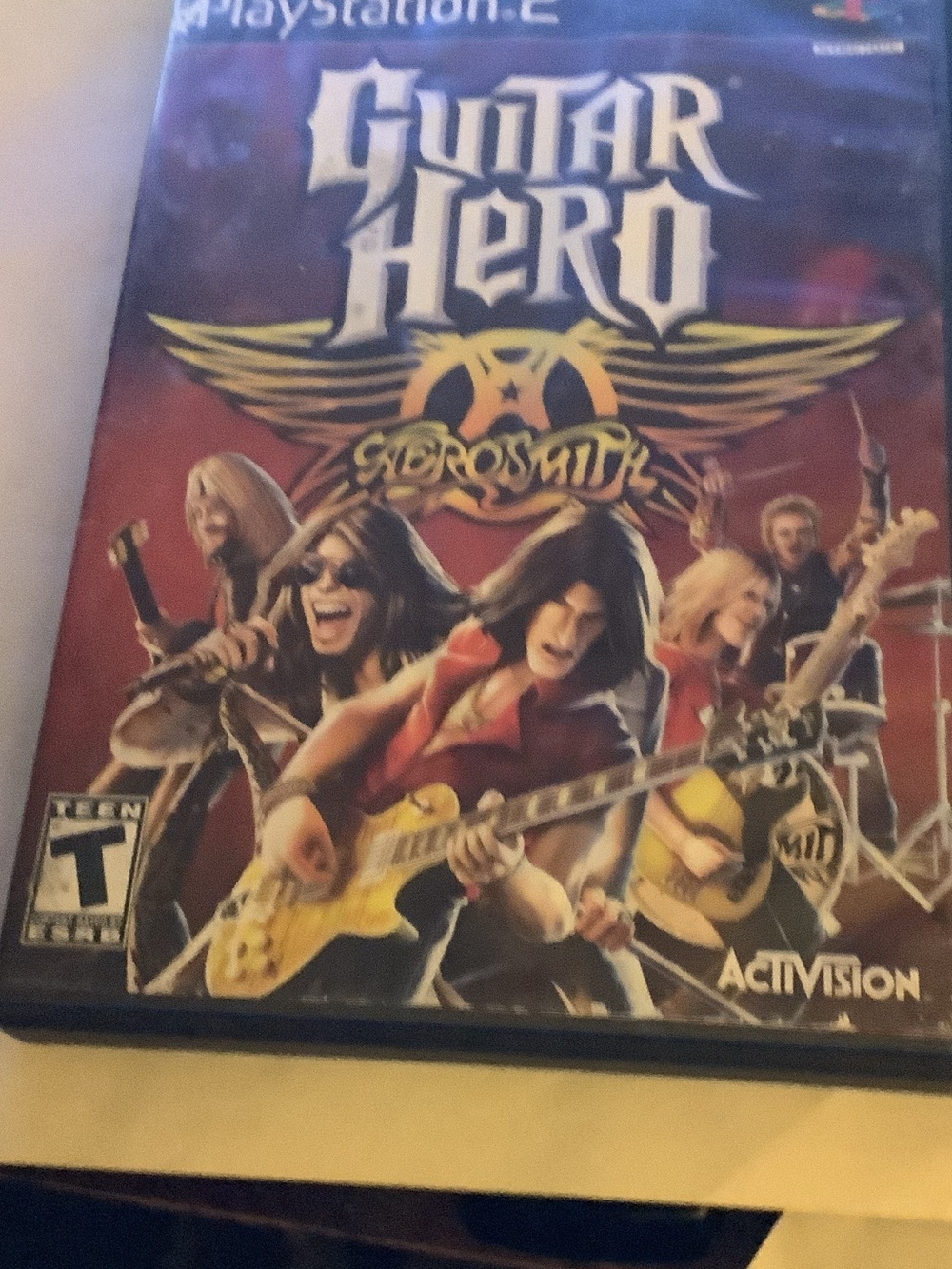 Guitar Hero: Aerosmith PlayStation 2 Game - Red Cover
